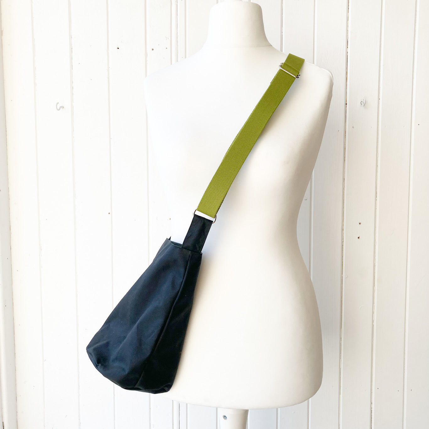 small black oilskin bucket bag