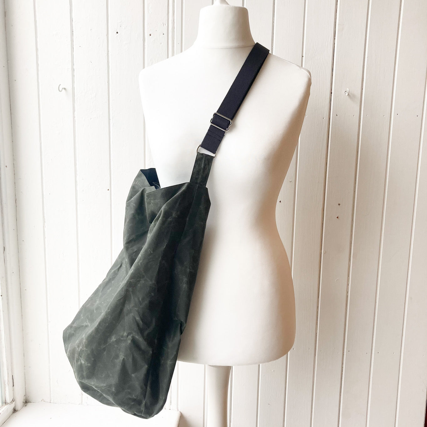 large dark khaki with charcoal strap oilskin bucket bag