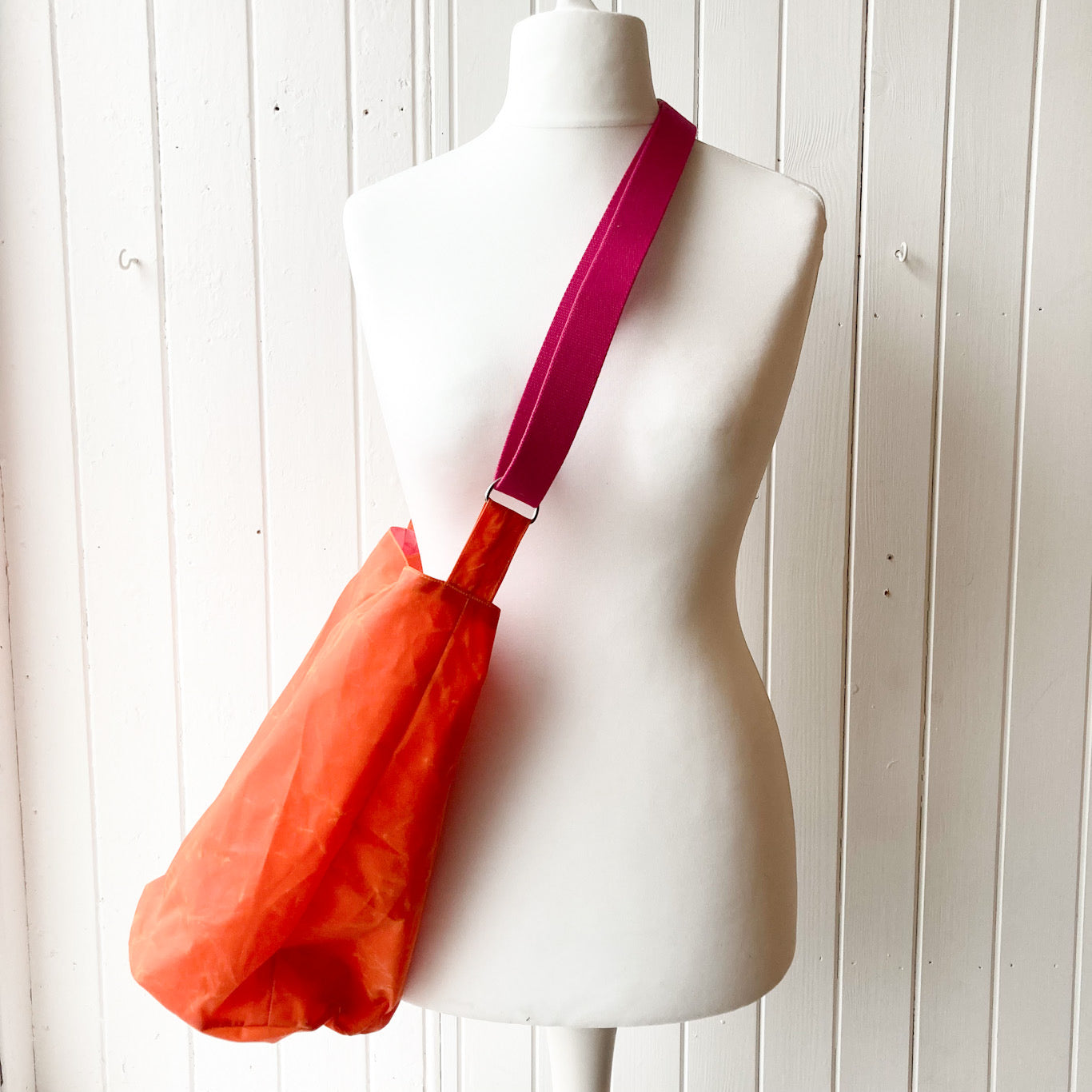 medium orange oilskin bucket bag