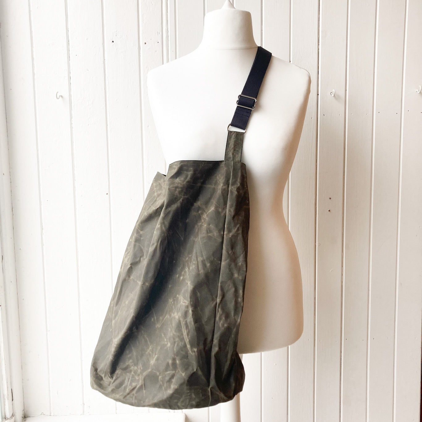 large brown with charcoal strap oilskin bucket bag