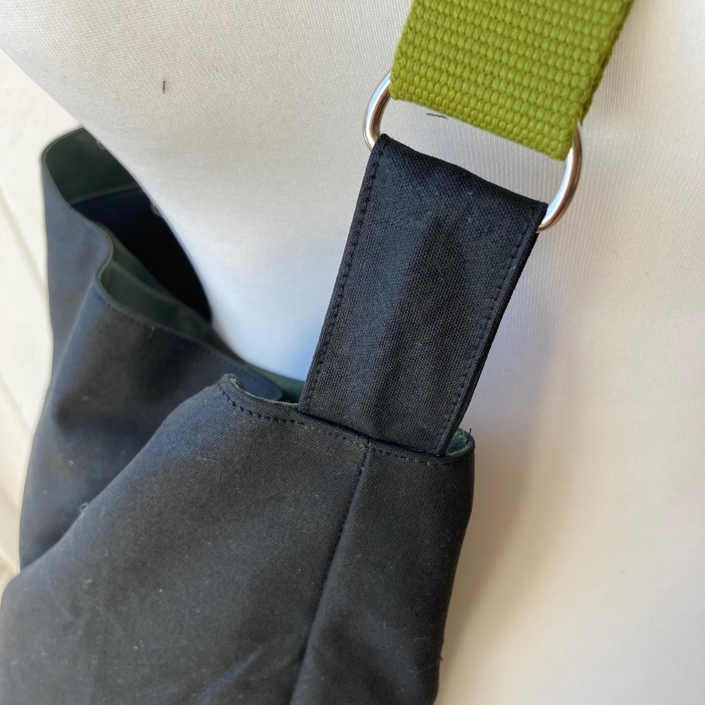 large black oilskin bucket bag