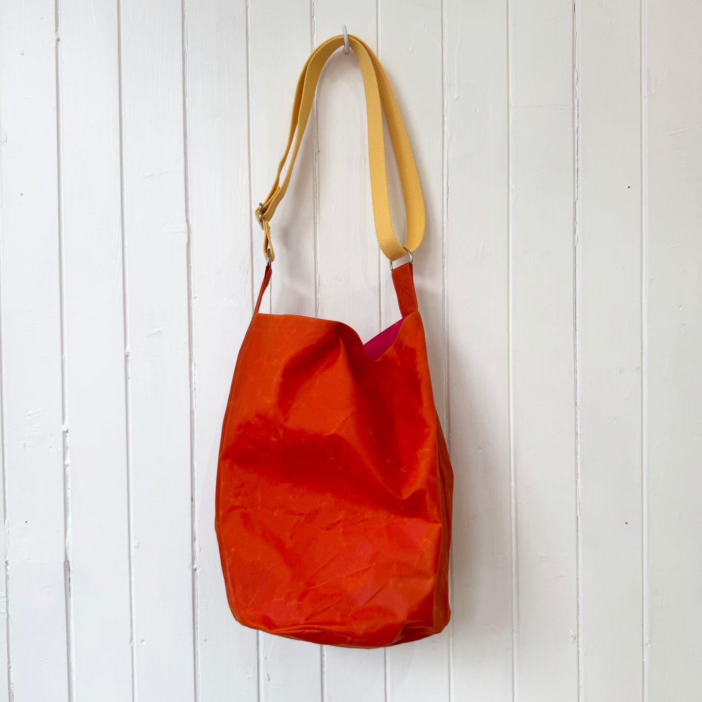 medium orange oilskin bucket bag