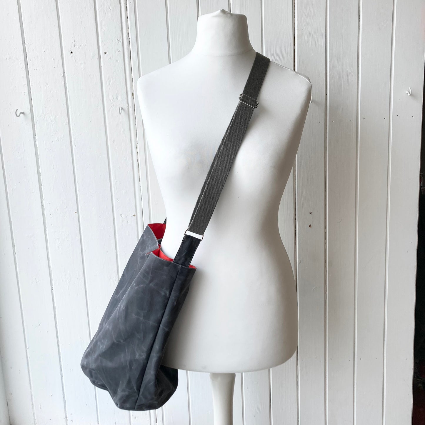 Copy of medium grey oilskin bucket bag with dark orange/red lining