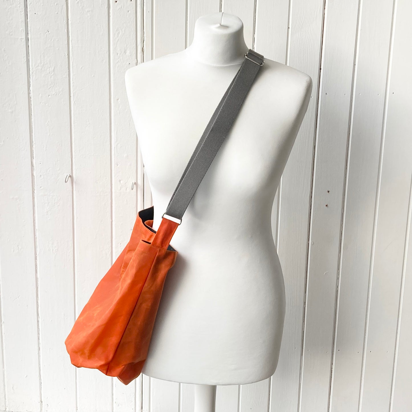 medium orange oilskin bucket bag