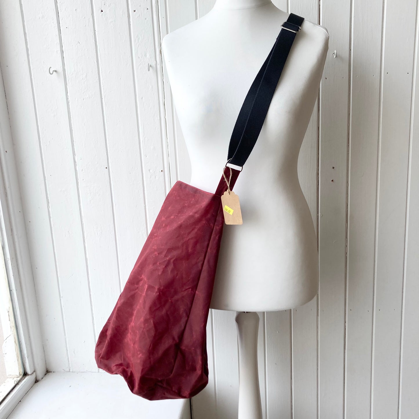 large dark red oilskin bucket with pink lining