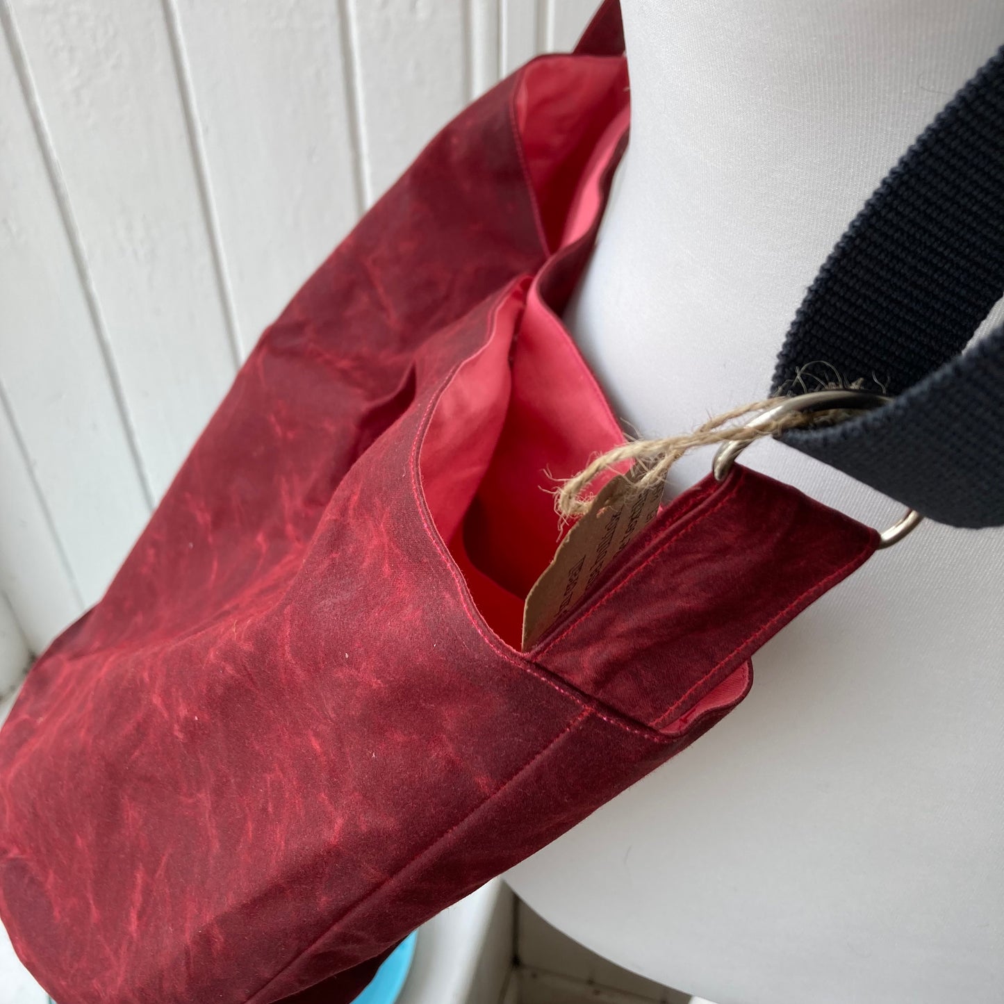 large dark red oilskin bucket with pink lining
