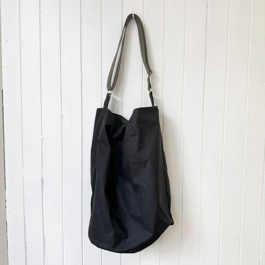 large dark khaki oilskin bucket bag