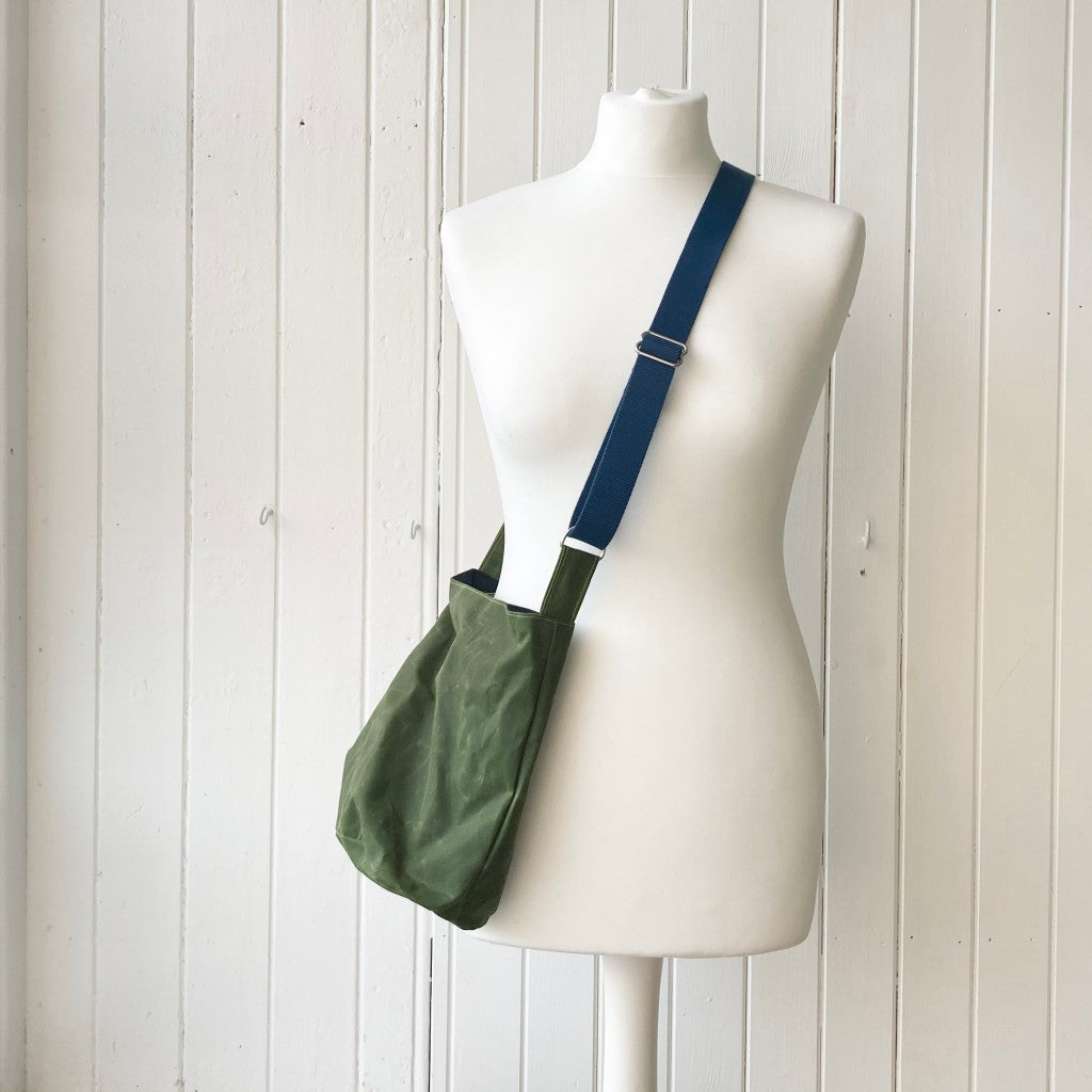 small green with blue strap oilskin bucket bag