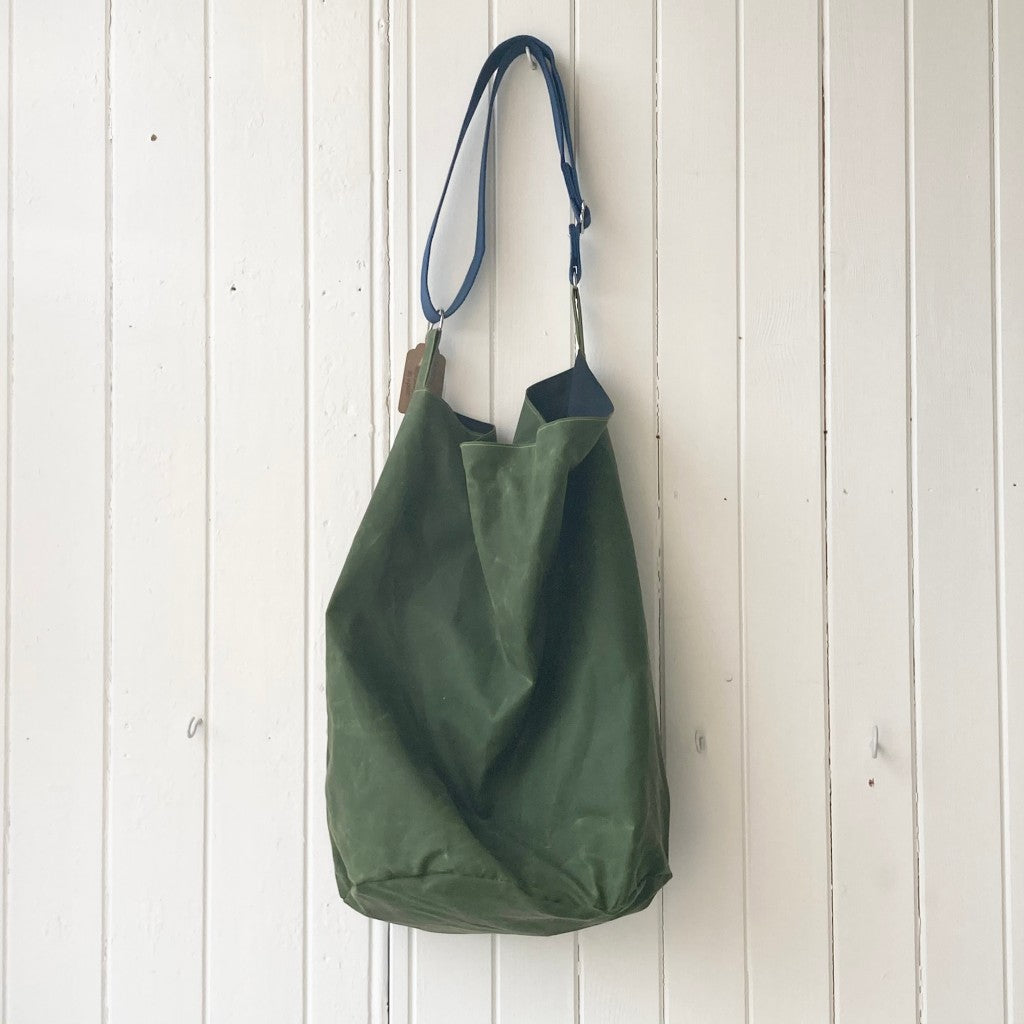 large green with blue strap oilskin bucket bag